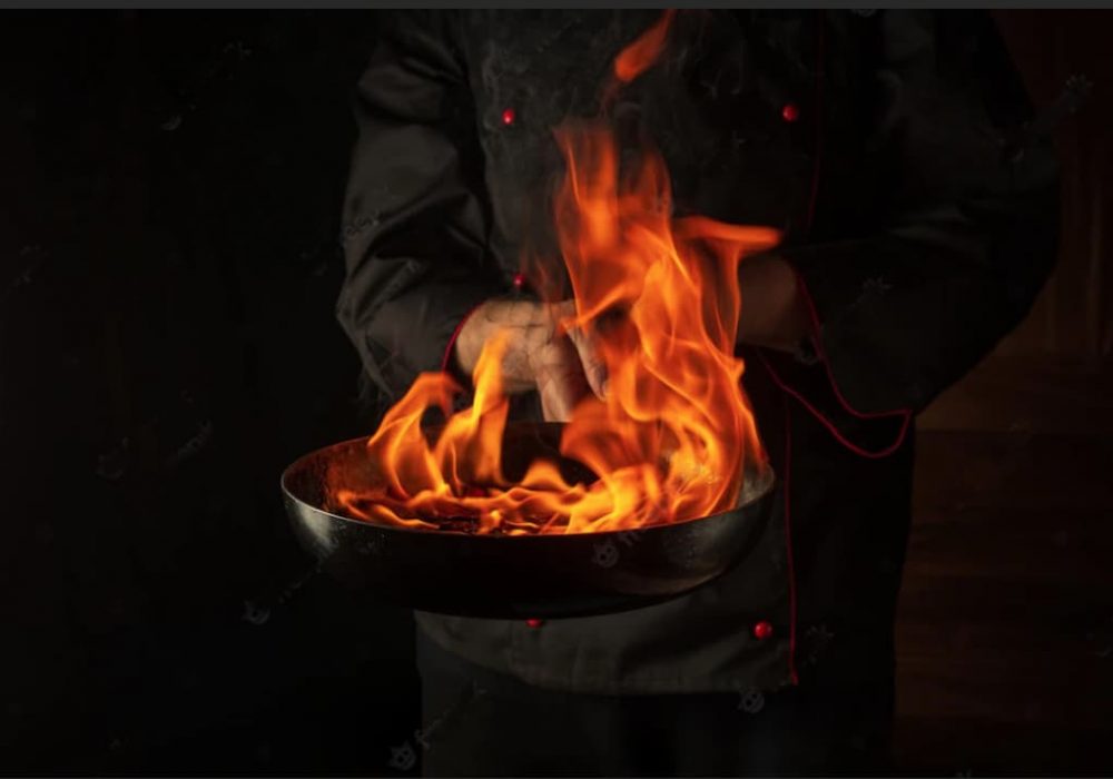 Sarten con aceite prendida por el fuego